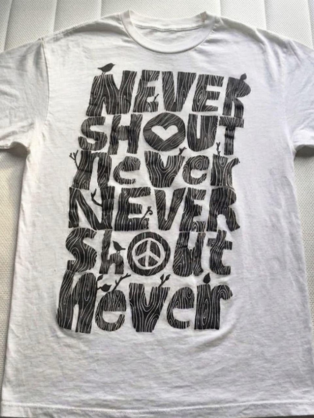 White Graphic Short-Sleeve Men's T-Shirt - 'Never Shout Never' Print
